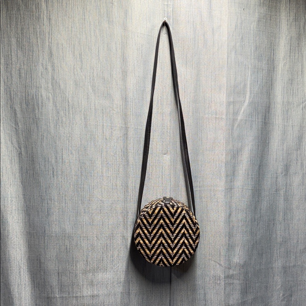 Lionel Chevron Patterned round Crossbody Bag